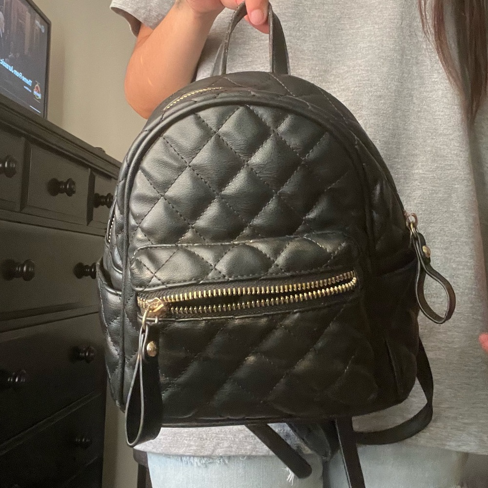Mini backpack. Bought from needmystyle.com years ago